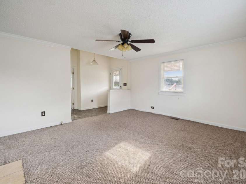 411 Central Avenue, Landis, NC 28088.  MLS# CAR4273594, YatesRealty ID 801. Living Room