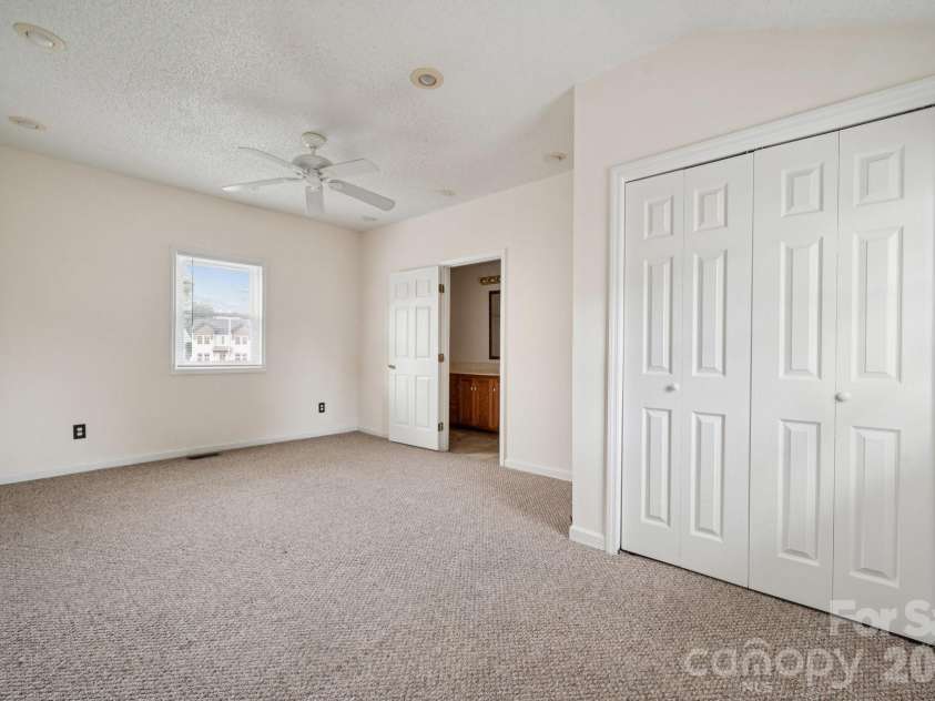 411 Central Avenue, Landis, NC 28088.  MLS# CAR4273594, YatesRealty ID 801. Primary Bedroom w/ Primary Bathroom & Walk-in Closet