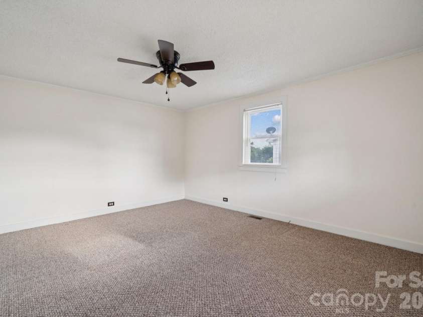 411 Central Avenue, Landis, NC 28088.  MLS# CAR4273594, YatesRealty ID 801. Second Guest Bedroom