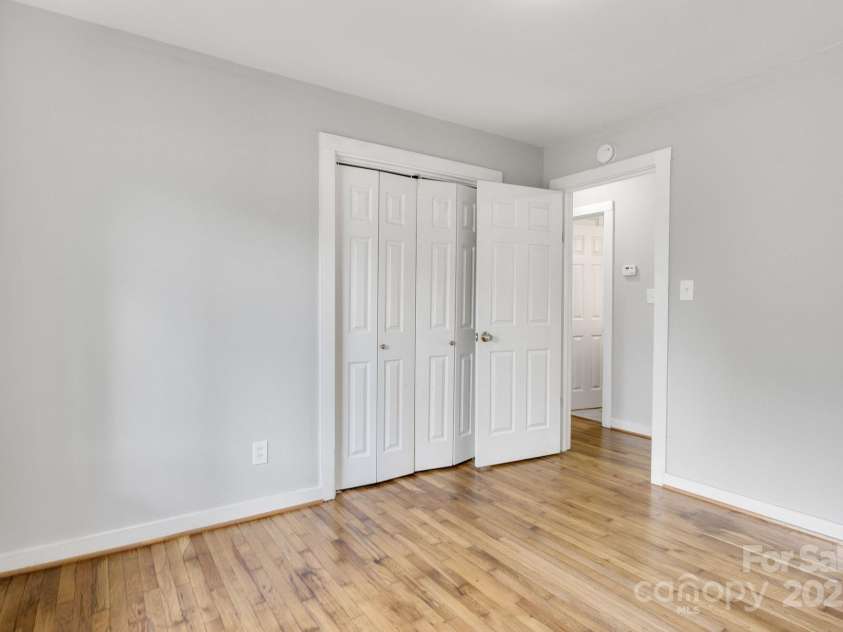 801 Bilmark Avenue, Charlotte, NC 28213.  MLS# CAR4247710, YatesRealty ID 8010. First bedroom facing entry door.