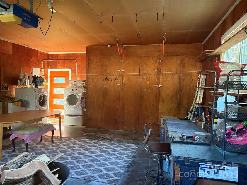 1235 Pinebrook Circle, Hendersonville, NC 28739.  MLS# CAR4309617, YatesRealty ID 8011. Garage Workshop