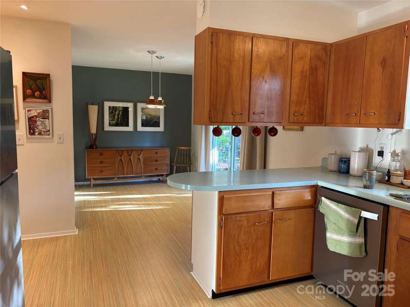 1235 Pinebrook Circle, Hendersonville, NC 28739.  MLS# CAR4309617, YatesRealty ID 8011. Kitchen and Dining room