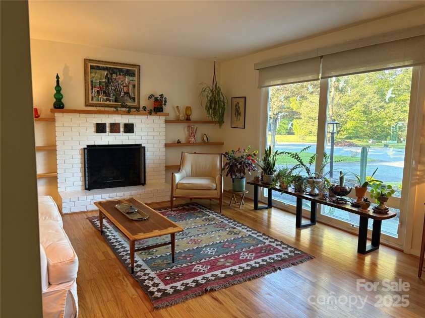 1235 Pinebrook Circle, Hendersonville, NC 28739.  MLS# CAR4309617, YatesRealty ID 8011. Living room, front windows