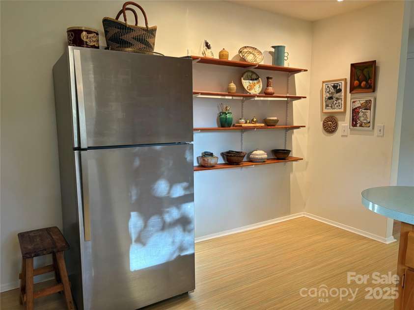 1235 Pinebrook Circle, Hendersonville, NC 28739.  MLS# CAR4309617, YatesRealty ID 8011. Refrigerator, Kitchen Shelves