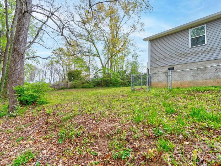 208 Poston Street, Shelby, NC 28150.  MLS# CAR4363643, YatesRealty ID 8013. Side Yard