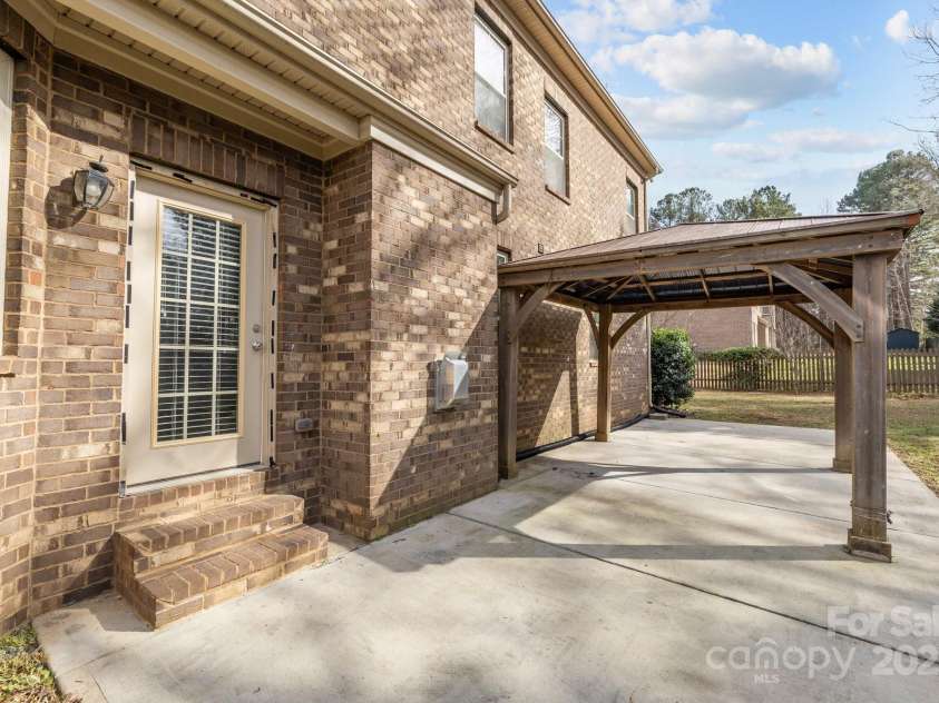12515 Hashanli Place, Matthews, NC 28105.  MLS# CAR4221773, YatesRealty ID 8015. Extended Patio with Gazebo