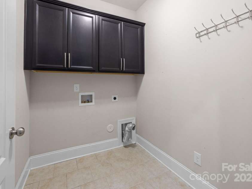 12515 Hashanli Place, Matthews, NC 28105.  MLS# CAR4221773, YatesRealty ID 8015. First Floor Laundry Room