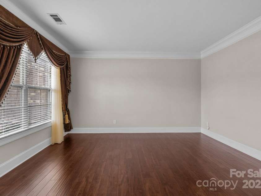 12515 Hashanli Place, Matthews, NC 28105.  MLS# CAR4221773, YatesRealty ID 8015. Formal Living Room