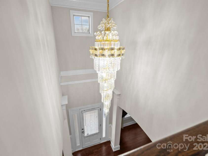 12515 Hashanli Place, Matthews, NC 28105.  MLS# CAR4221773, YatesRealty ID 8015. Gorgeous Crystal Chandelier Included!