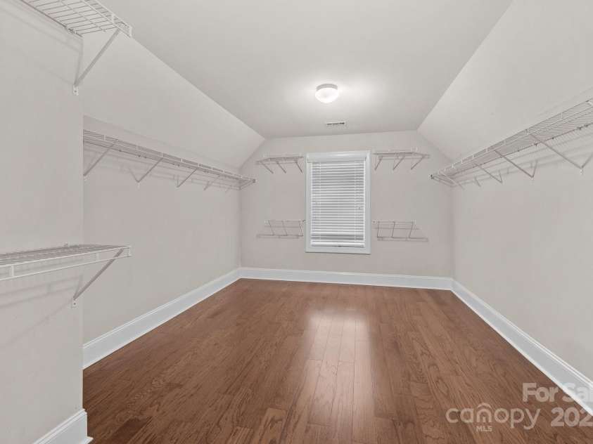 12515 Hashanli Place, Matthews, NC 28105.  MLS# CAR4221773, YatesRealty ID 8015. Huge Closet in Primary Suite!