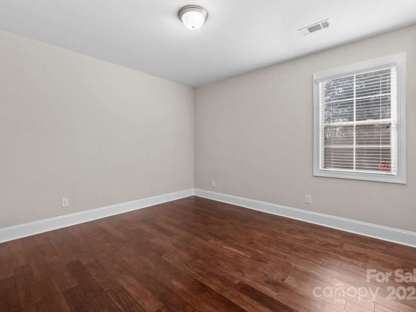 12515 Hashanli Place, Matthews, NC 28105.  MLS# CAR4221773, YatesRealty ID 8015. Main Level Bedroom