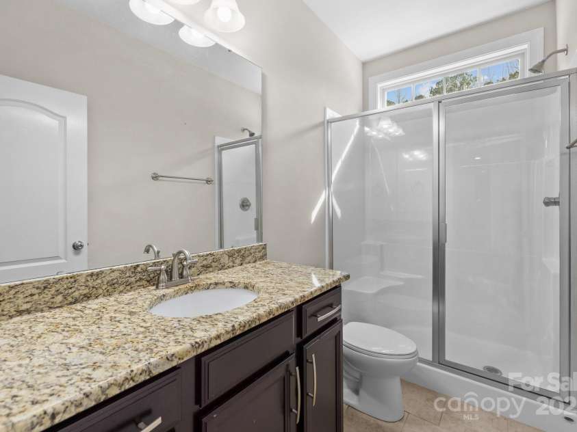 12515 Hashanli Place, Matthews, NC 28105.  MLS# CAR4221773, YatesRealty ID 8015. Main Level Full Bath