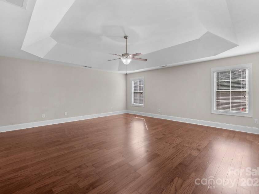 12515 Hashanli Place, Matthews, NC 28105.  MLS# CAR4221773, YatesRealty ID 8015. Second Floor Primary Bedroom