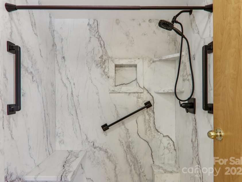 126 Pasco Loop, Waynesville, NC 28785.  MLS# CAR4301663, YatesRealty ID 8018. Newly renovated step in shower