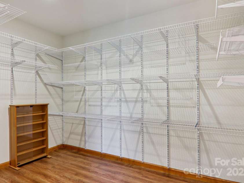 126 Pasco Loop, Waynesville, NC 28785.  MLS# CAR4301663, YatesRealty ID 8018. Oversized storage room off primary bedroom