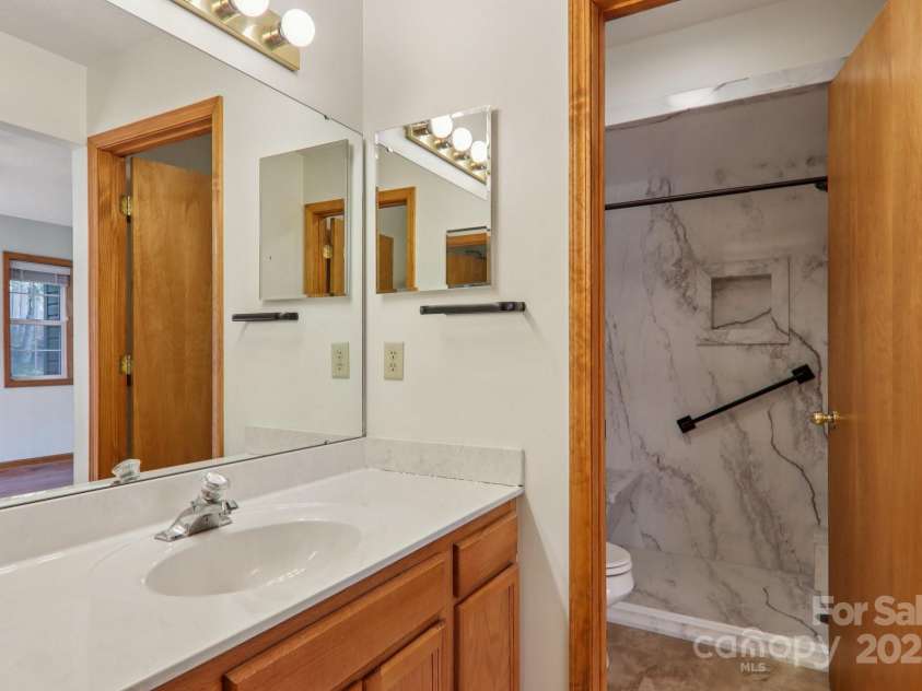 126 Pasco Loop, Waynesville, NC 28785.  MLS# CAR4301663, YatesRealty ID 8018. Primary bathroom/ ensuite