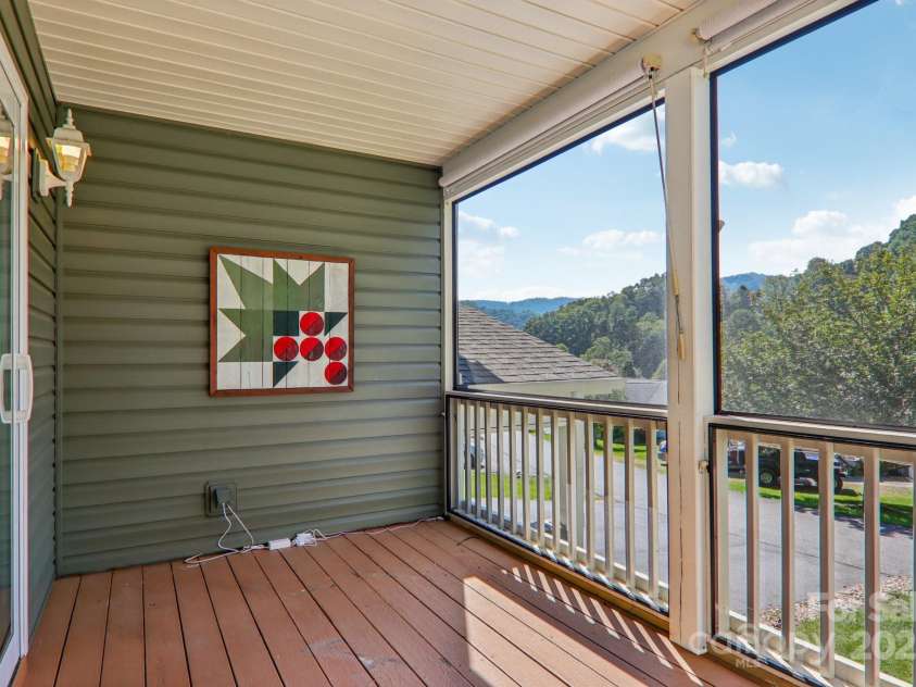 126 Pasco Loop, Waynesville, NC 28785.  MLS# CAR4301663, YatesRealty ID 8018. Screening in porch 