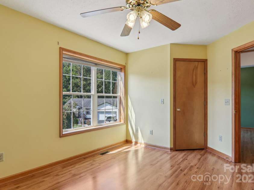 126 Pasco Loop, Waynesville, NC 28785.  MLS# CAR4301663, YatesRealty ID 8018. Upstairs bedroom
