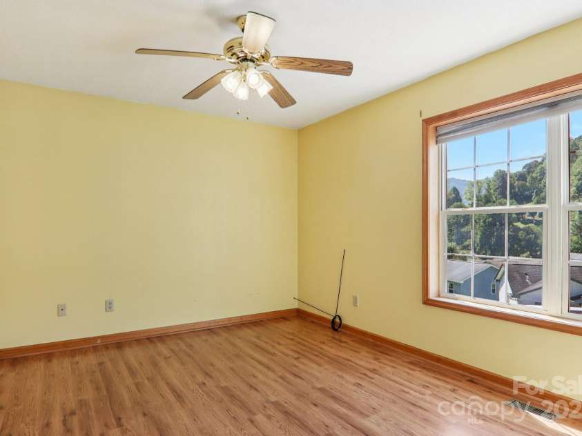 126 Pasco Loop, Waynesville, NC 28785.  MLS# CAR4301663, YatesRealty ID 8018. Upstairs bedroom