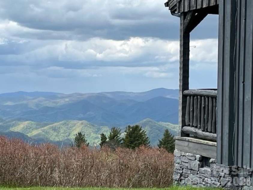 143 Daniel Boone Trail, Burnsville, NC 28714.  MLS# CAR4261449, YatesRealty ID 802. Incredible layered mountain views