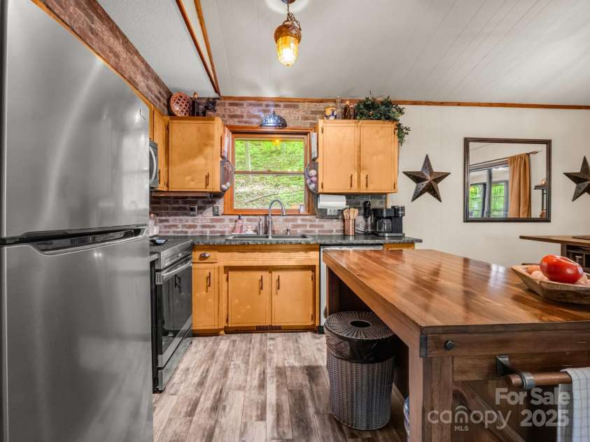 245 Chalet Road, Lake Lure, NC 28746.  MLS# CAR4251348, YatesRealty ID 8023. 