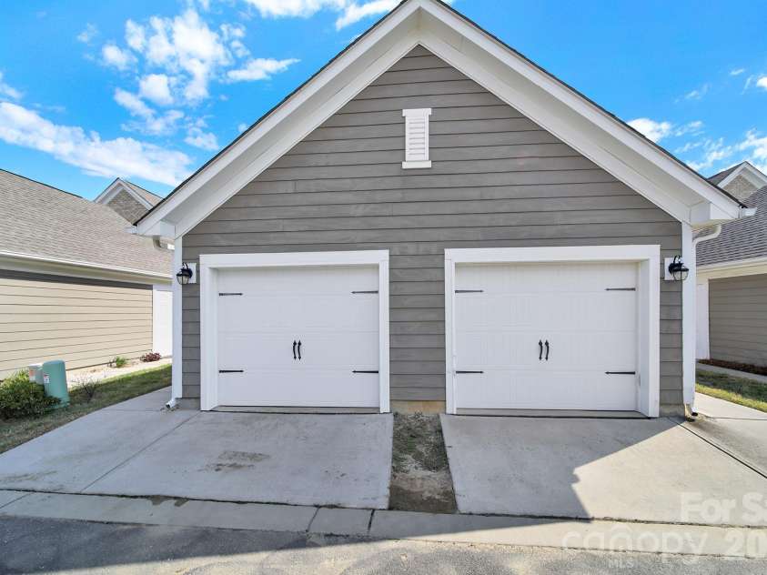 6946 Walnut Branch Lane, Charlotte, NC 28277.  MLS# CAR4298180, YatesRealty ID 8026. 1 car garage (left side).