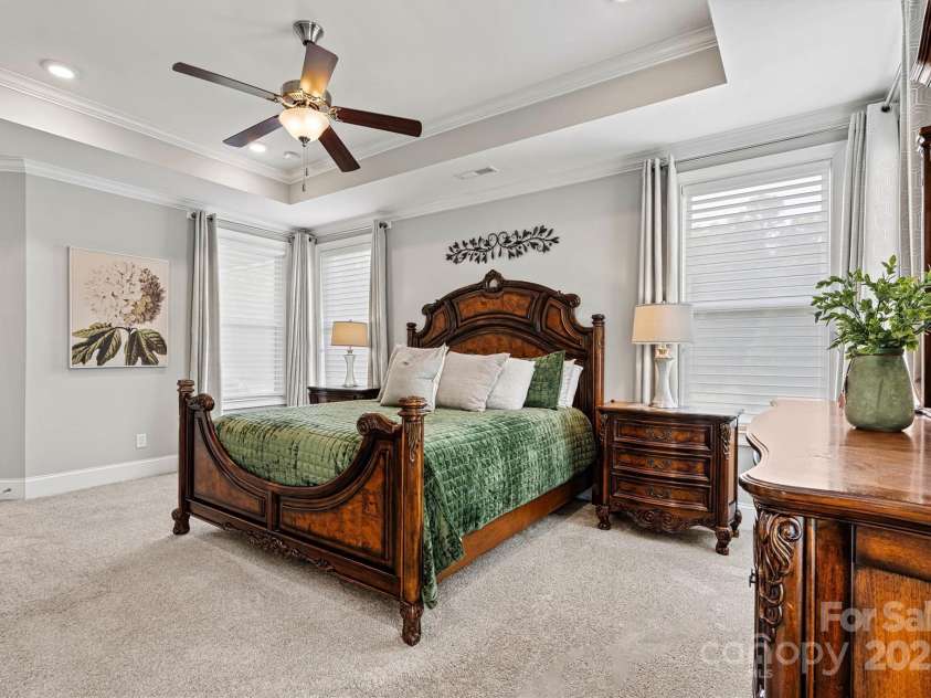 7549 Short Putt Court, Charlotte, NC 28215.  MLS# CAR4248938, YatesRealty ID 8028. A spacious, versatile retreat with endless possibilities for furniture placement, this Primary Suite is your perfect sanctuary.