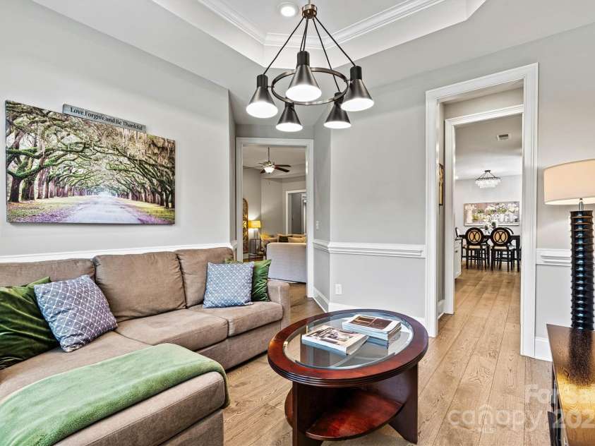 7549 Short Putt Court, Charlotte, NC 28215.  MLS# CAR4248938, YatesRealty ID 8028. From every view, this Dining Room (currently being used as a Sitting Room/Den) impresses!