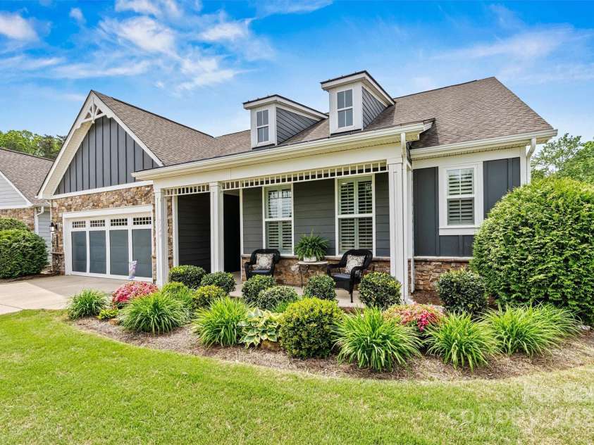 7549 Short Putt Court, Charlotte, NC 28215.  MLS# CAR4248938, YatesRealty ID 8028. Start your mornings right!  This charming covered front porch is perfect for sipping coffee and greeting friendly neighbors as they stroll by.