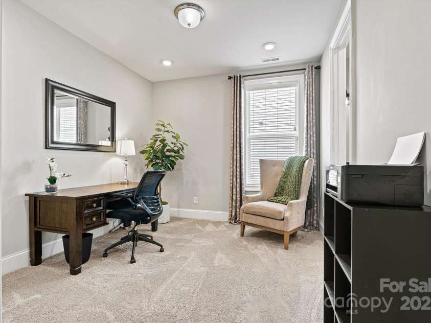 7549 Short Putt Court, Charlotte, NC 28215.  MLS# CAR4248938, YatesRealty ID 8028. The third bedroom, with a nice-sized closet, can easily double as an Office or Study—giving you the flexibility to make this space work for your needs.