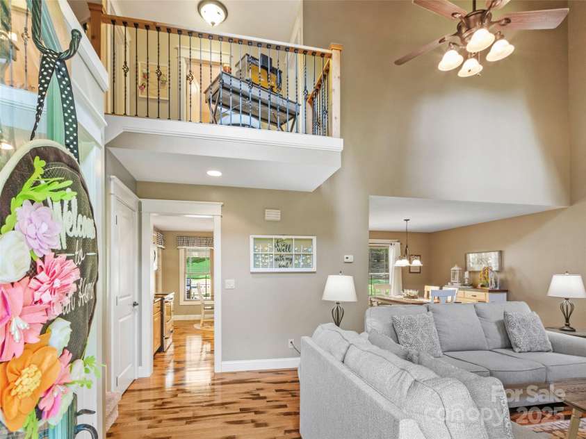 35 Lands End Drive, Burnsville, NC 28714.  MLS# CAR4221215, YatesRealty ID 803. Front entrance from rocking chair front porch