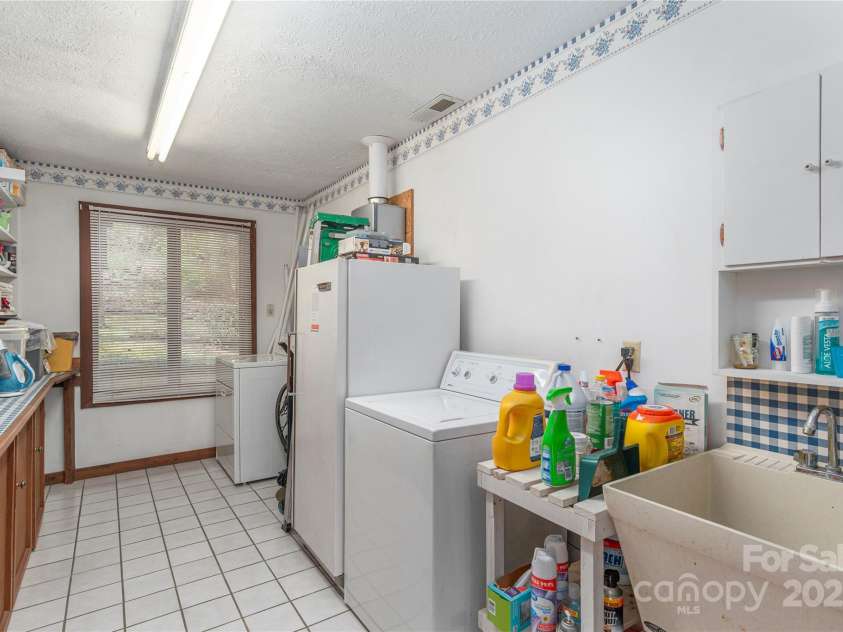 22 Waynewood Drive, Waynesville, NC 28786.  MLS# CAR4249792, YatesRealty ID 8033. Laundry room