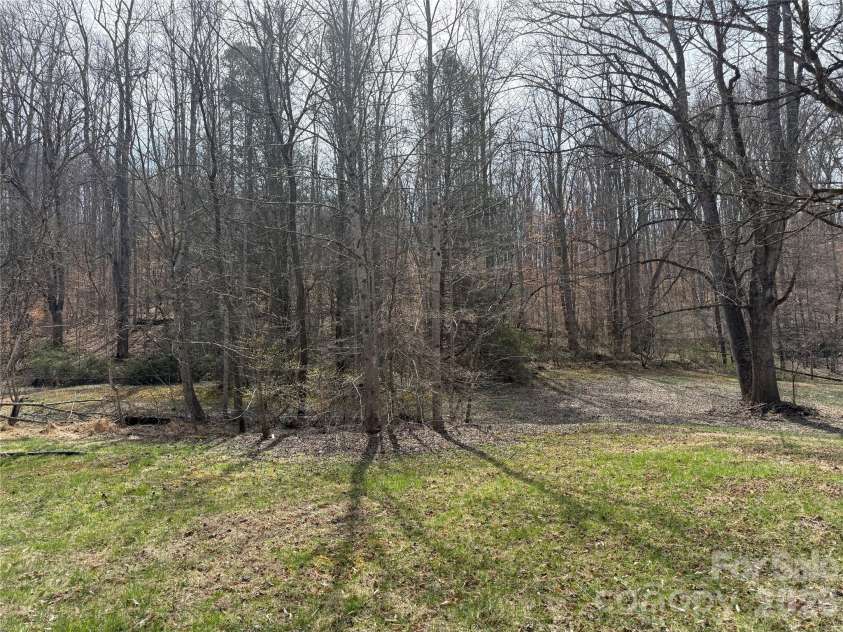 57 Fork Road, Barnardsville, NC 28709.  MLS# CAR4334387, YatesRealty ID 8038. Explore this property and find old road beds.
