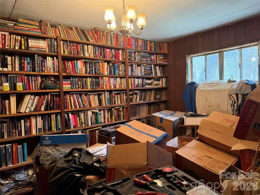 57 Fork Road, Barnardsville, NC 28709.  MLS# CAR4334387, YatesRealty ID 8038. Library, study, dining room? Bring your vision!