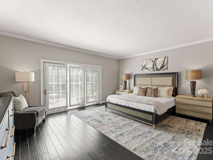 2445 Selwyn Avenue, Charlotte, NC 28209.  MLS# CAR4234376, YatesRealty ID 8039. Generous bedroom with door to patio