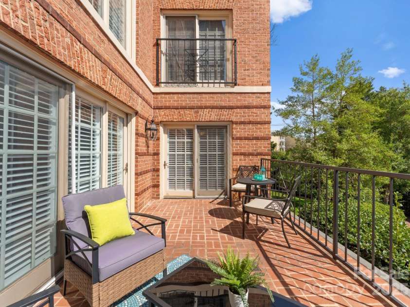2445 Selwyn Avenue, Charlotte, NC 28209.  MLS# CAR4234376, YatesRealty ID 8039. One of the view units with a patio looking at MPCC