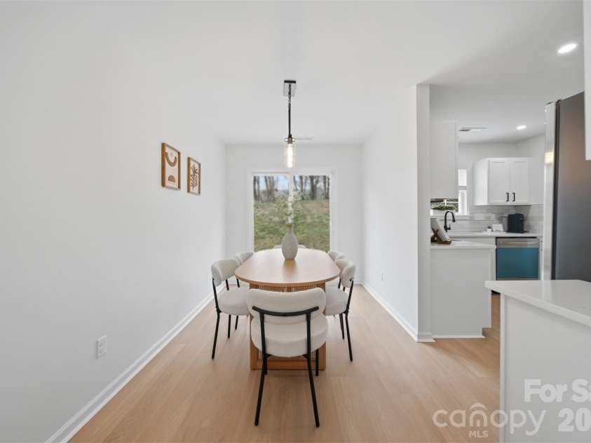 1494 Kindred Circle, Concord, NC 28027.  MLS# CAR4351536, YatesRealty ID 8040. 10 Dinning Room is adjacent to the kitchen.