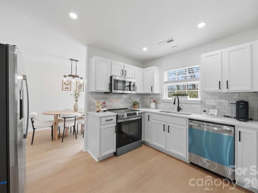 1494 Kindred Circle, Concord, NC 28027.  MLS# CAR4351536, YatesRealty ID 8040. 12 Kitchen featuring newly installed appliances.