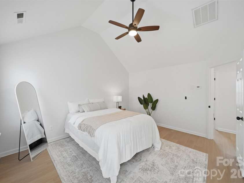 1494 Kindred Circle, Concord, NC 28027.  MLS# CAR4351536, YatesRealty ID 8040. 21 Primary bedroom featuring high ceilings.
