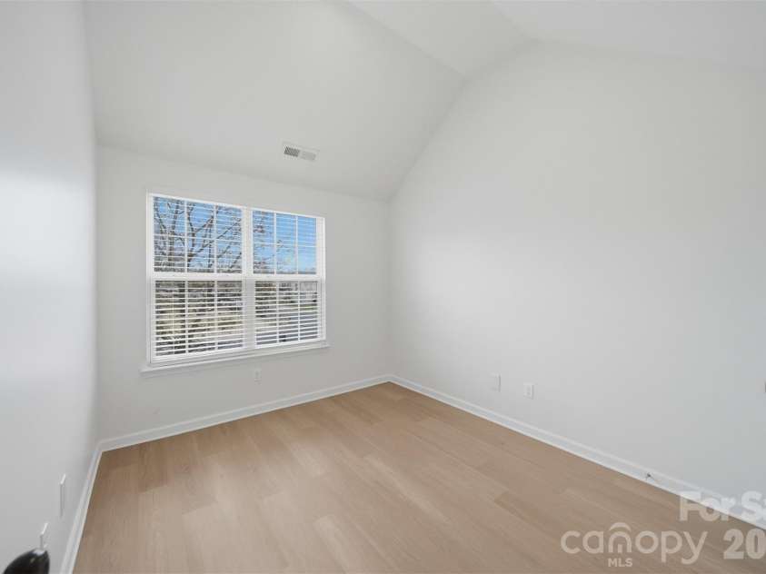 1494 Kindred Circle, Concord, NC 28027.  MLS# CAR4351536, YatesRealty ID 8040. 27 Third Bedroom with high celings, new flooring 