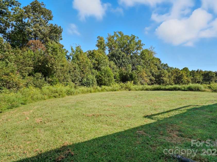 345 Knox Farm Road, Statesville, NC 28677.  MLS# CAR4304653, YatesRealty ID 8043. Backyard Graded Area