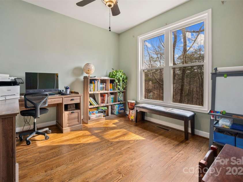 693 Rockwood Lane, Tryon, NC 28782.  MLS# CAR4234370, YatesRealty ID 8043. 1st floor bedroom