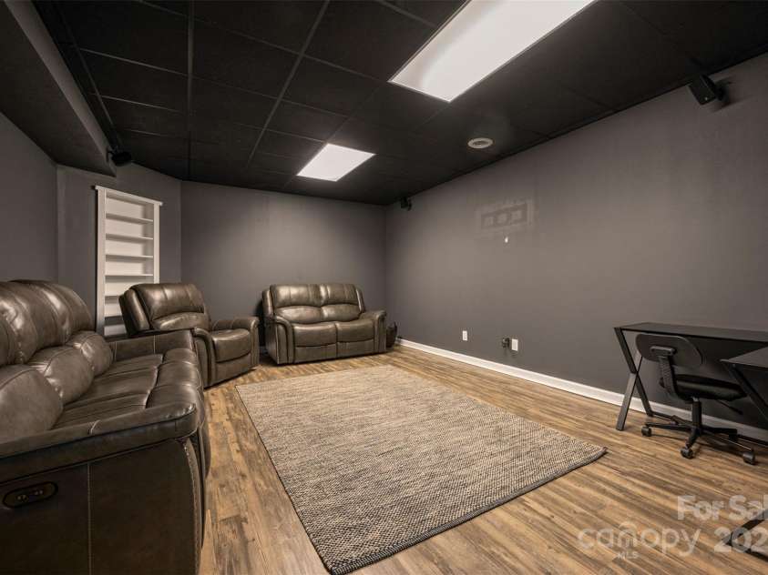693 Rockwood Lane, Tryon, NC 28782.  MLS# CAR4234370, YatesRealty ID 8043. Media room