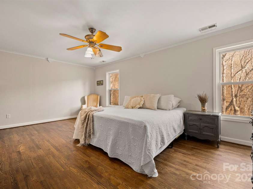 693 Rockwood Lane, Tryon, NC 28782.  MLS# CAR4234370, YatesRealty ID 8043. Primary bedroom