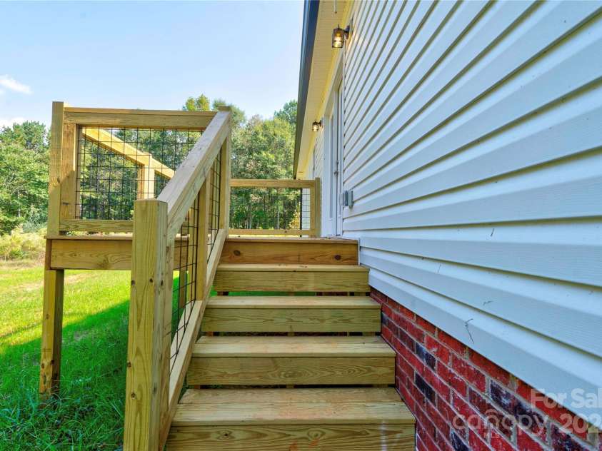 107 Falls Street, Lawndale, NC 28090.  MLS# CAR4188617, YatesRealty ID 8044. Back Deck