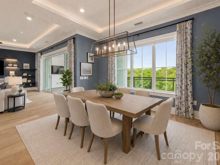 19329 Watermark Drive, Cornelius, NC 28031.  MLS# CAR4366392, YatesRealty ID 8051. Open concept virtually staged dining  with views