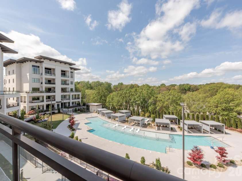 19329 Watermark Drive, Cornelius, NC 28031.  MLS# CAR4366392, YatesRealty ID 8051. Overlooking the pool