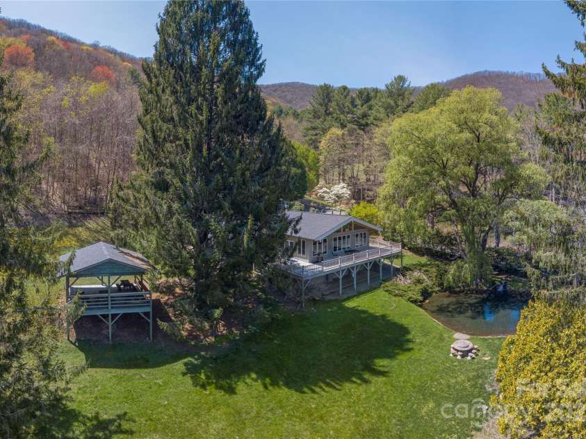 55 Grove Park, Waynesville, NC 28786.  MLS# CAR4218196, YatesRealty ID 8054. Aerial of house and pavillion