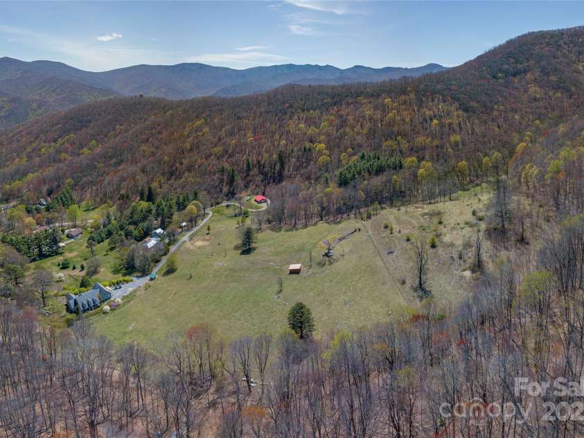 55 Grove Park, Waynesville, NC 28786.  MLS# CAR4218196, YatesRealty ID 8054. Aerial view from parkway side (southside)