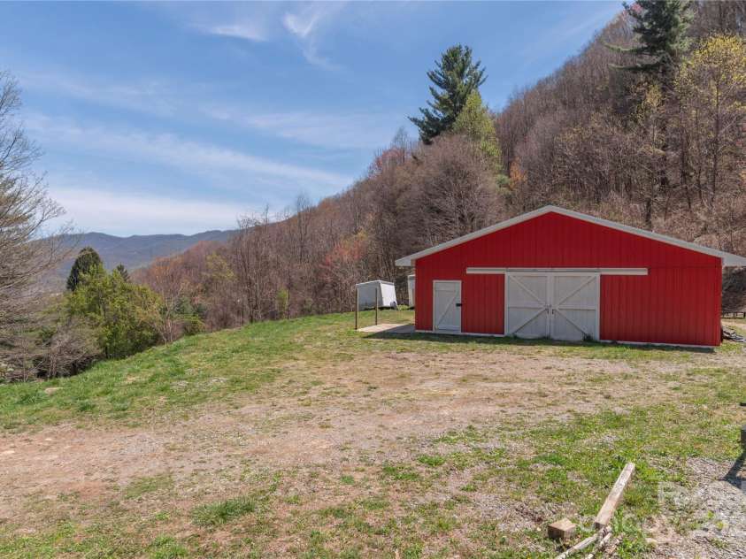 55 Grove Park, Waynesville, NC 28786.  MLS# CAR4218196, YatesRealty ID 8054. Barn in pasture